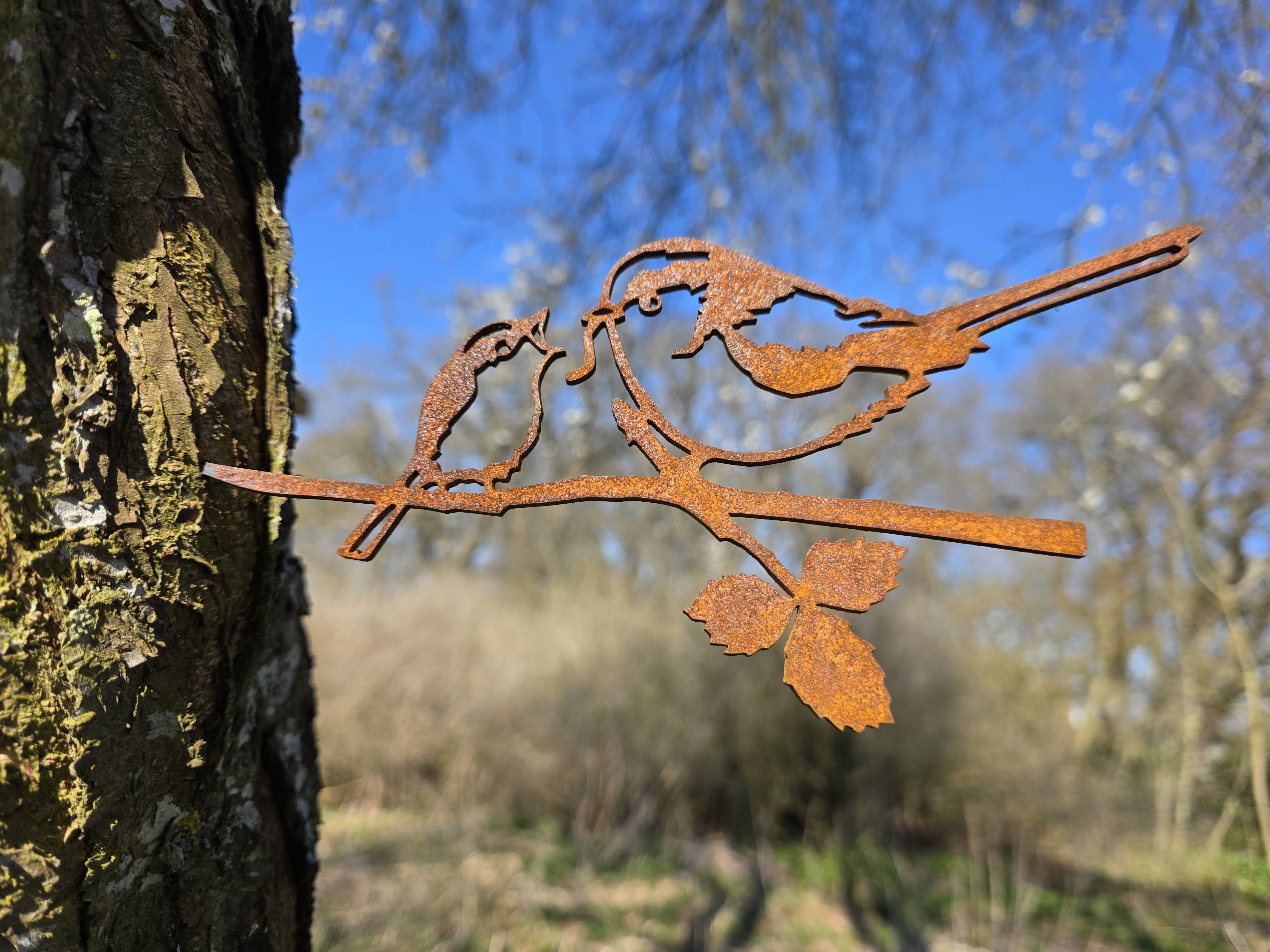 Halemejse med unger i cortenst�l